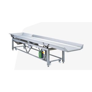 Vibrating table for transport and selection of grapes